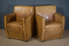 Pair of mid century leather chairs