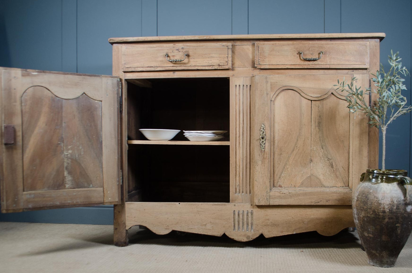 
Pale stripped French provincial sideboard with panelled cupboard doors