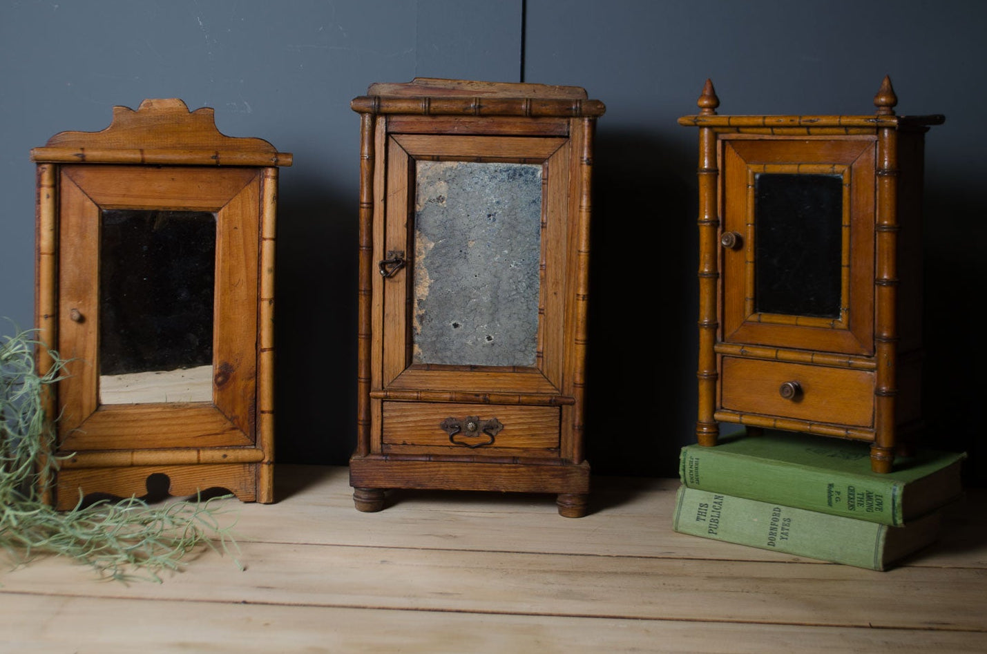 
Antique French bamboo medicine cupboard sold individually with original mirror glass.