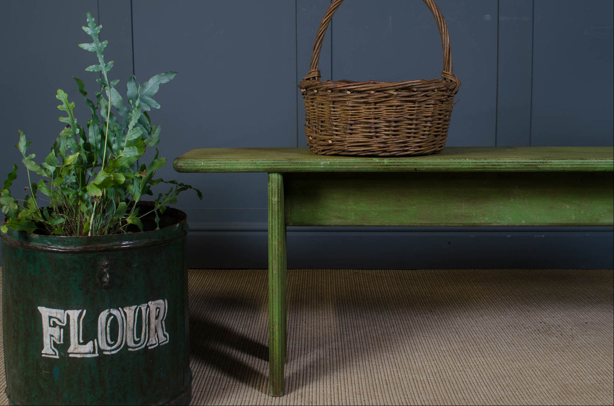 
Long French farmhouse benches with worn green paint
