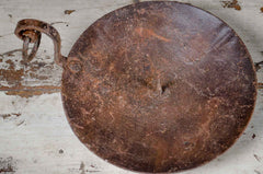 reclaimed indian candle holder with hook with a hook on a wooden surface