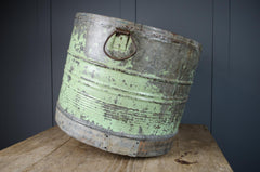 green chippy paint on galvanised metal bucket