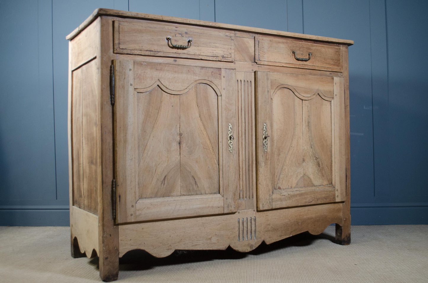 Interior storage of antique French oak sideboard with shelf