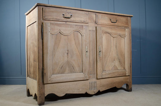 Interior storage of antique French oak sideboard with shelf