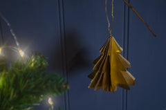 brass Christmas tree decoration

brass foil tree ornament

gold metal Christmas decoration

modern Christmas tree hanging ornament

Scandinavian Christmas décor

minimalist brass tree decoration

handmade metal Christmas ornament

festive brass hanging decoration