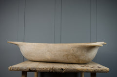 large dough bowl on grey wall