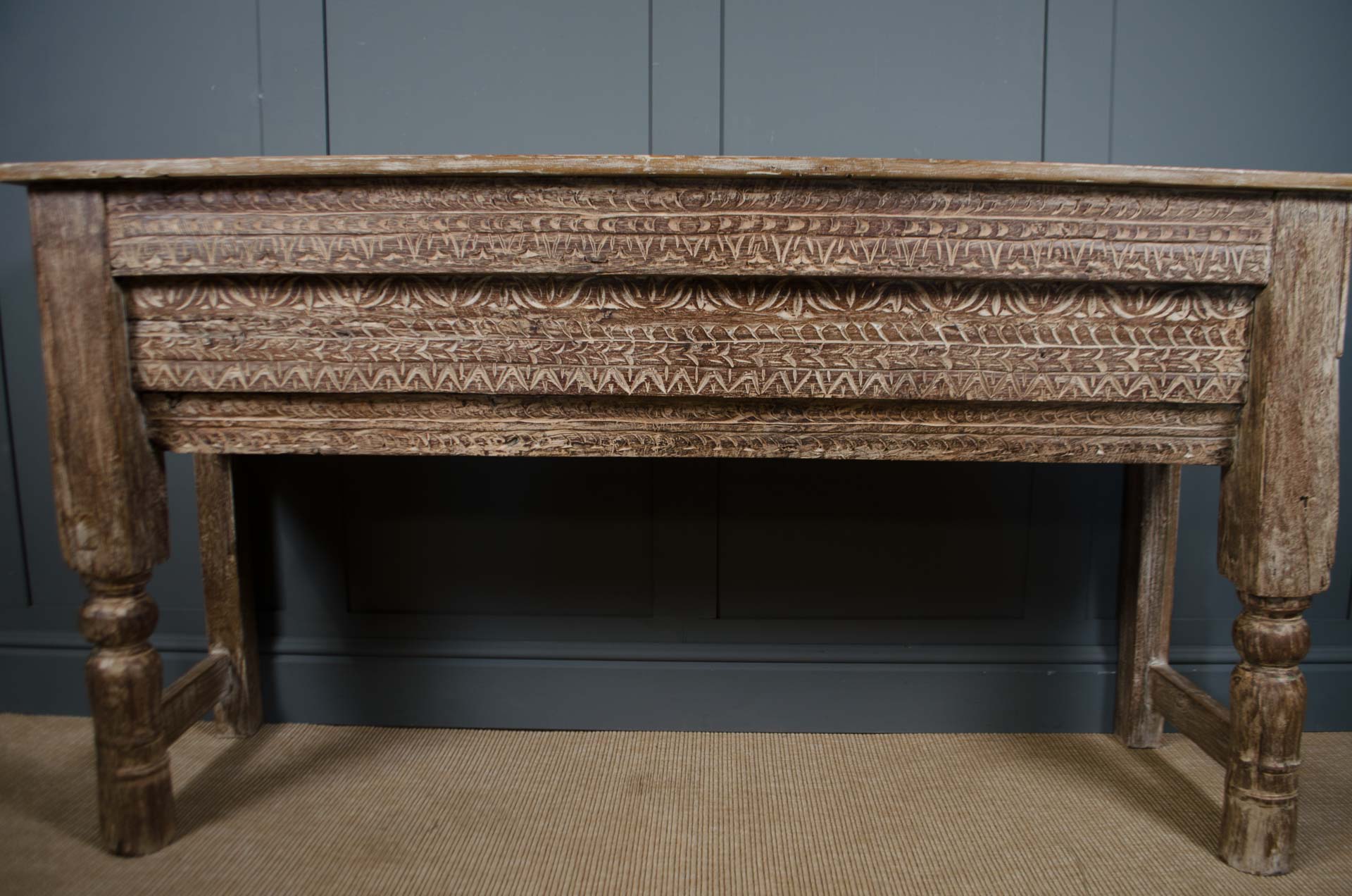 
Indian antique style console table in reclaimed teak with ornate carved frieze