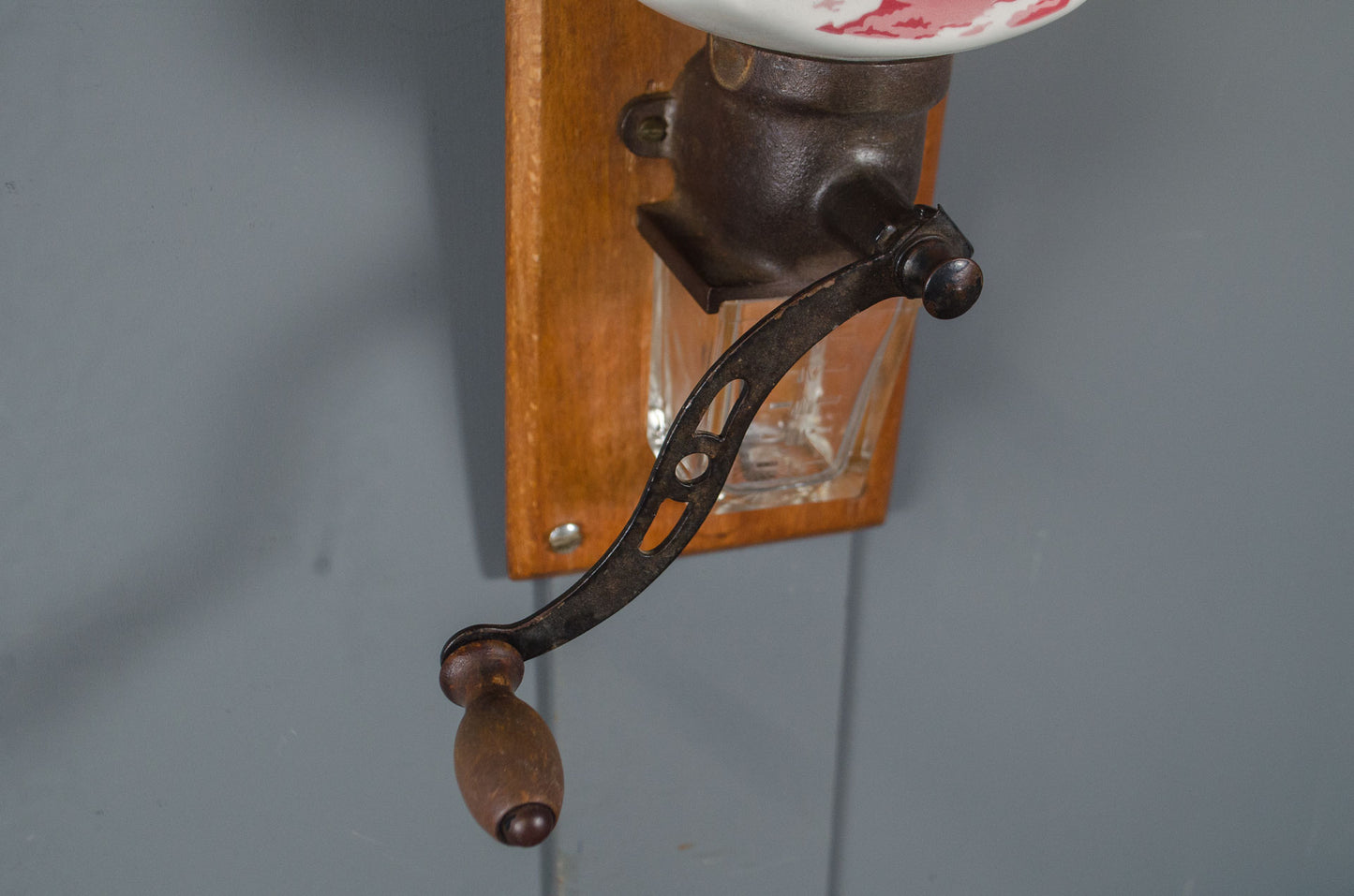 Vintage French ceramic and cast metal wall coffee grinder