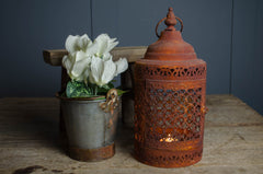 Pierced rusty lantern