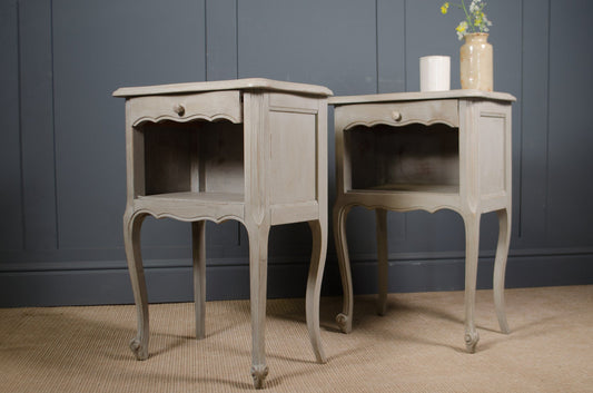 Louis XV style painted bedside tables with worn grey patina