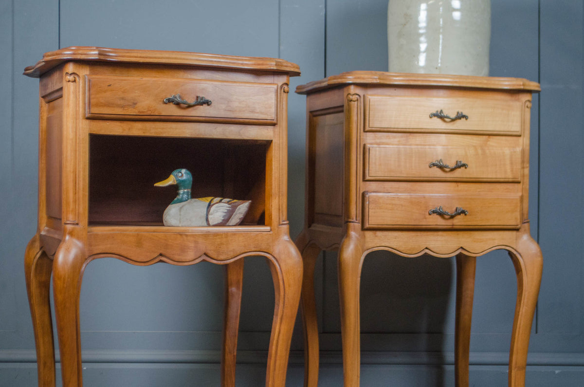 Pair of French his and hers bedside tables