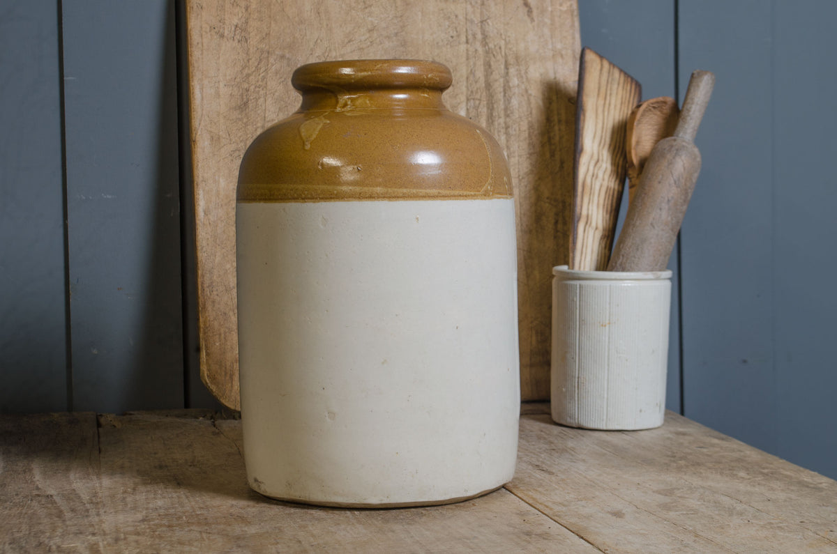 Small Bristol glaze stoneware lidded pot in honey brown and cream