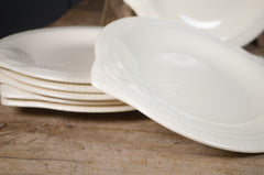 Vintage Longwy French fish-shaped plate in a soft cream glaze with age-related crazing and matching platter available.