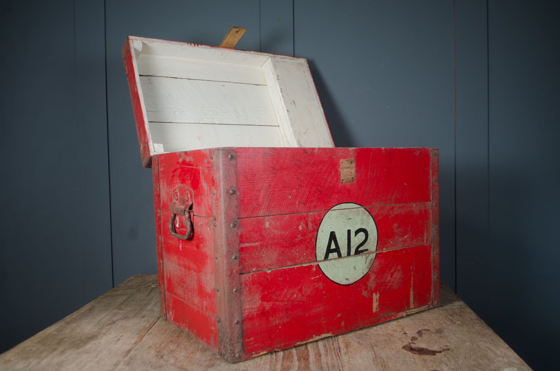 
Vintage red wooden storage chest with original painted finish