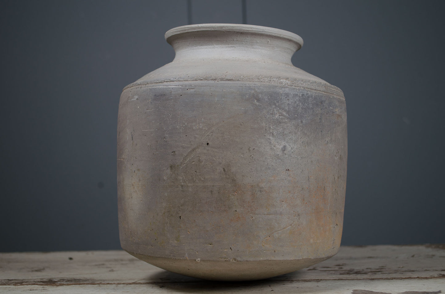 hand-thrown water pot, grey ceramic vase, curved bottom pot, rustic clay vessel, handmade pottery vase, textured ceramic decor, dried flower vase, sculptural ceramic pot, wabi-sabi pottery, minimalist ceramic home decor