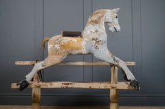 Freestanding vintage rocking horse with original rocker base