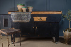 Reclaimed vintage school workbench

Stripped, polished, and waxed rustic wood top

Painted black base

Open cupboard and inset drawer

Aged metal plate from original vice fitting

Braked castors for easy movement

Ideal as a kitchen island, prep table, or console