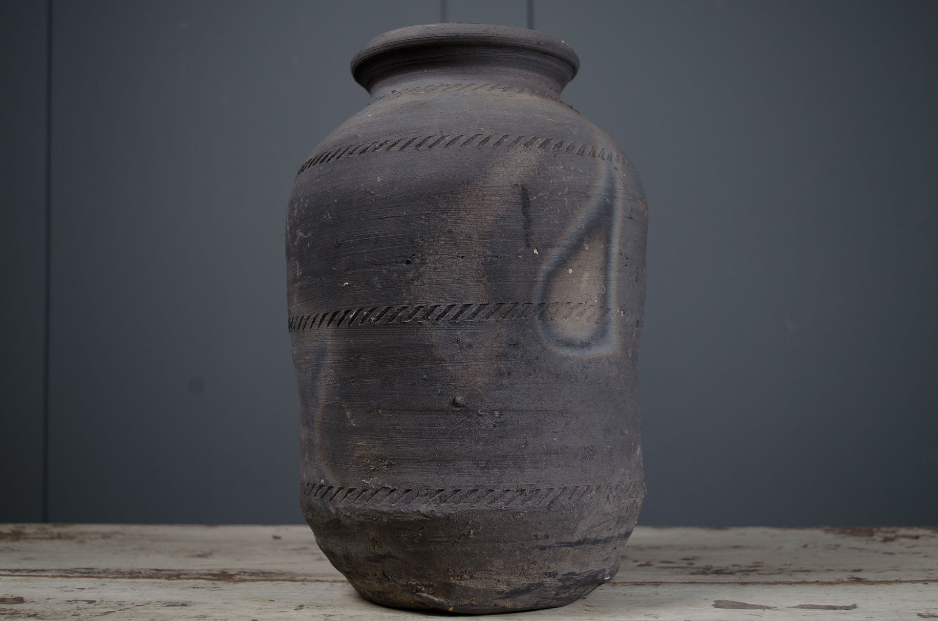 hand-thrown water pot, grey ceramic vase, curved bottom pot, rustic clay vessel, handmade pottery vase, textured ceramic decor, dried flower vase, sculptural ceramic pot, wabi-sabi pottery, minimalist ceramic home decor