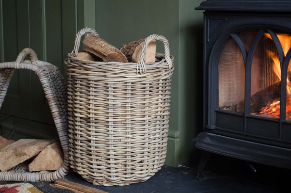 Round grey log basket