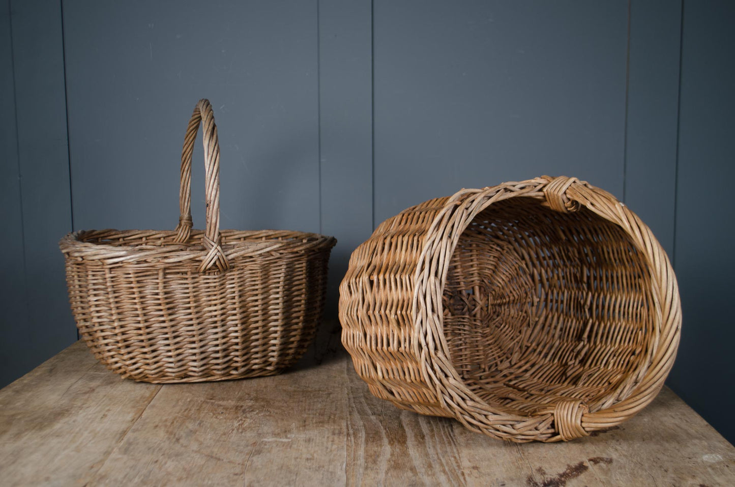 Vintage wicker trug basket with traditional arched handle
