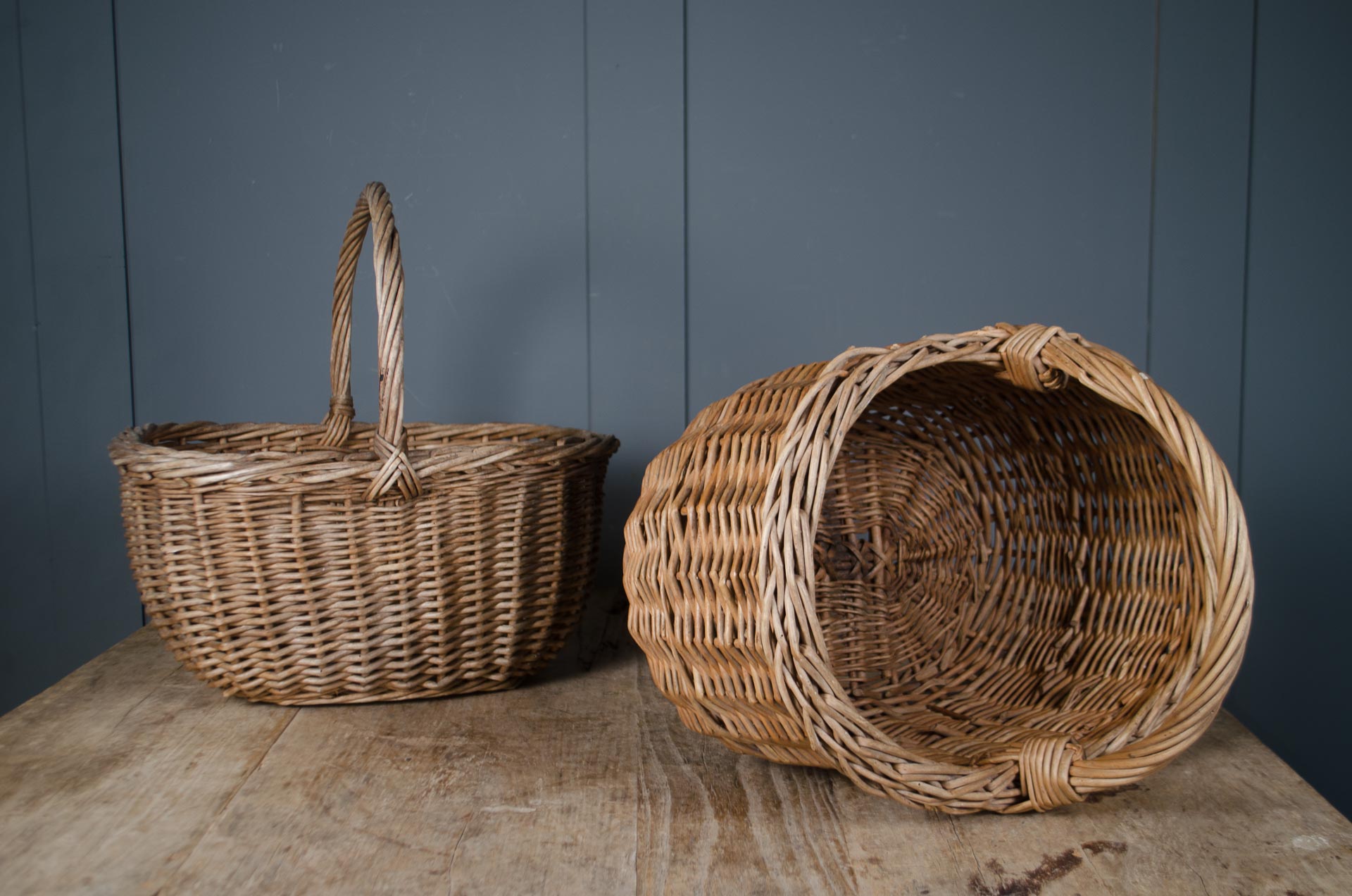 
Vintage wicker trug basket with traditional arched handle