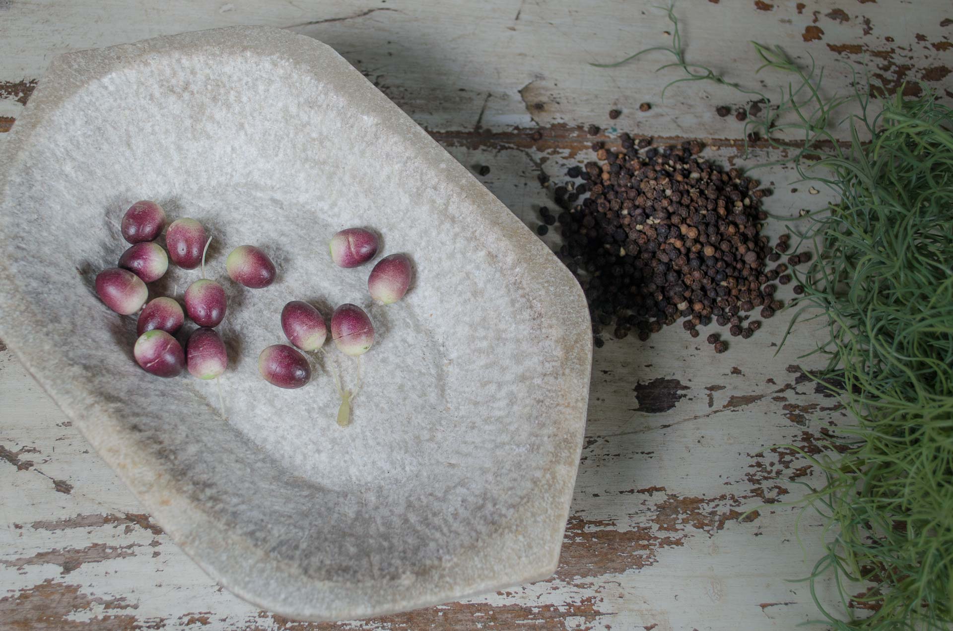 antique stone bowl, hand-carved Indian prep bowl, rustic stone kitchenware, vintage Indian stoneware, traditional grinding bowl, antique kitchen utensil, Indian cooking bowl, farmhouse decor stone bowl, primitive kitchen bowl, authentic Indian antique bowl.