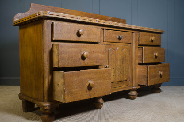 Impressive large-scale Victorian antique sideboard with acorn bun feet, rear upstand and painted scumble glazed top. Authentic 19th-century farmhouse storage piece.