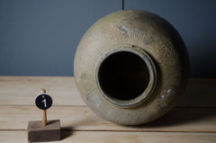 Antique hand-thrown Chinese pottery jars sold individually with aged character and texture.