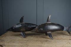 Reclaimed metal dolphin sculpture