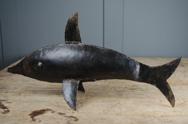 Reclaimed metal dolphin sculpture