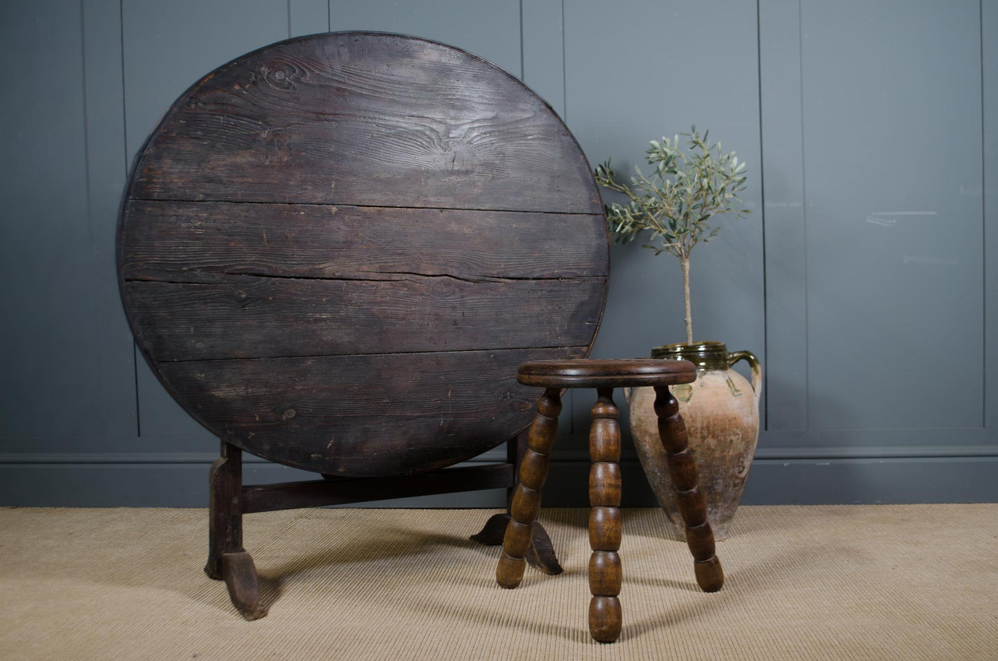 Antique French vineyard table with round tilt top design