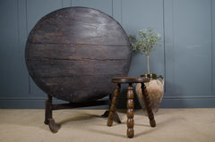 Antique French vineyard table with round tilt top design