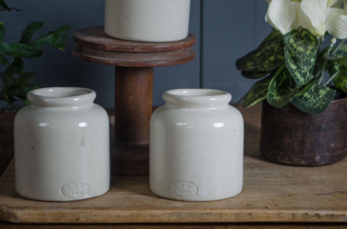 
French stoneware mustard pots used for pencil storage