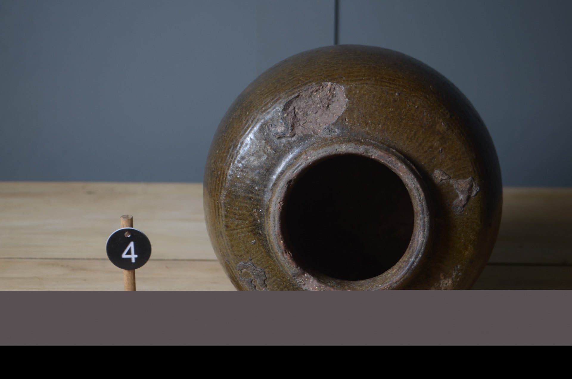 
Antique hand-thrown Chinese pottery jars sold individually with aged character and texture.