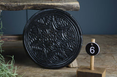 Large hand carved stone trivet