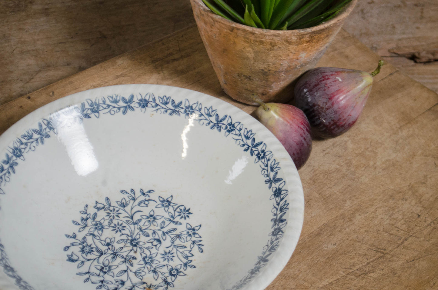 French terre de fer bowl with blue floral decoration