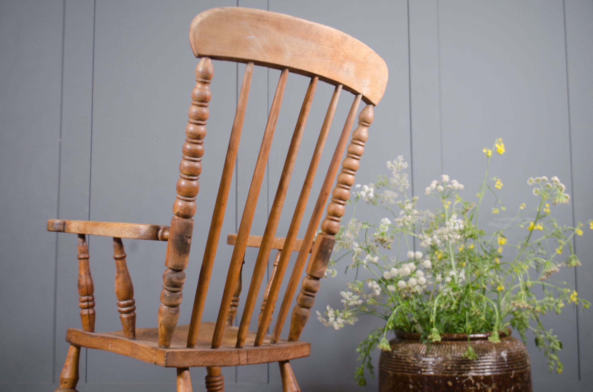 
Vintage farmhouse carver chair with turned spindle detailing