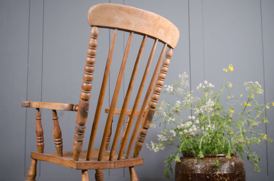 Vintage farmhouse carver chair with turned spindle detailing