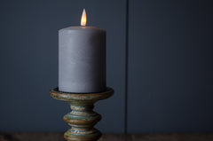 Painted green candlestick