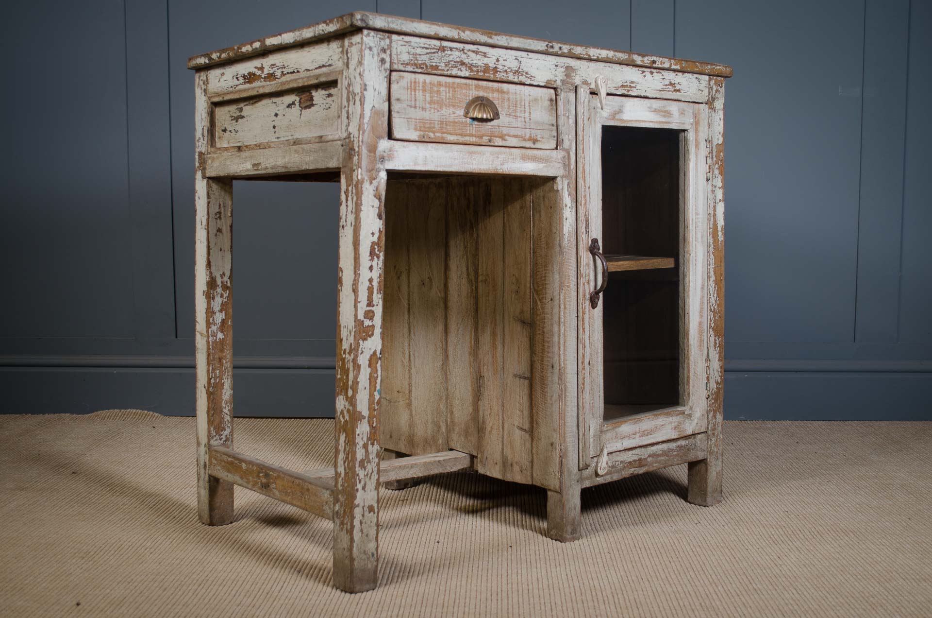 reclaimed teak wood desk, whitewashed painted desk, small teak dressing table, compact writing desk, rustic teak TV unit, bathroom storage cabinet, teak desk with cupboard, vintage whitewashed furniture, brass hardware desk, reclaimed teak furniture
