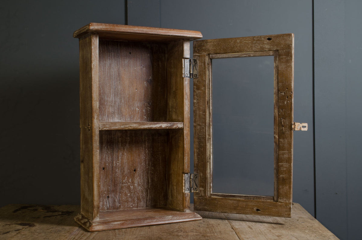 
Rustic wooden bathroom cabinet with internal shelf