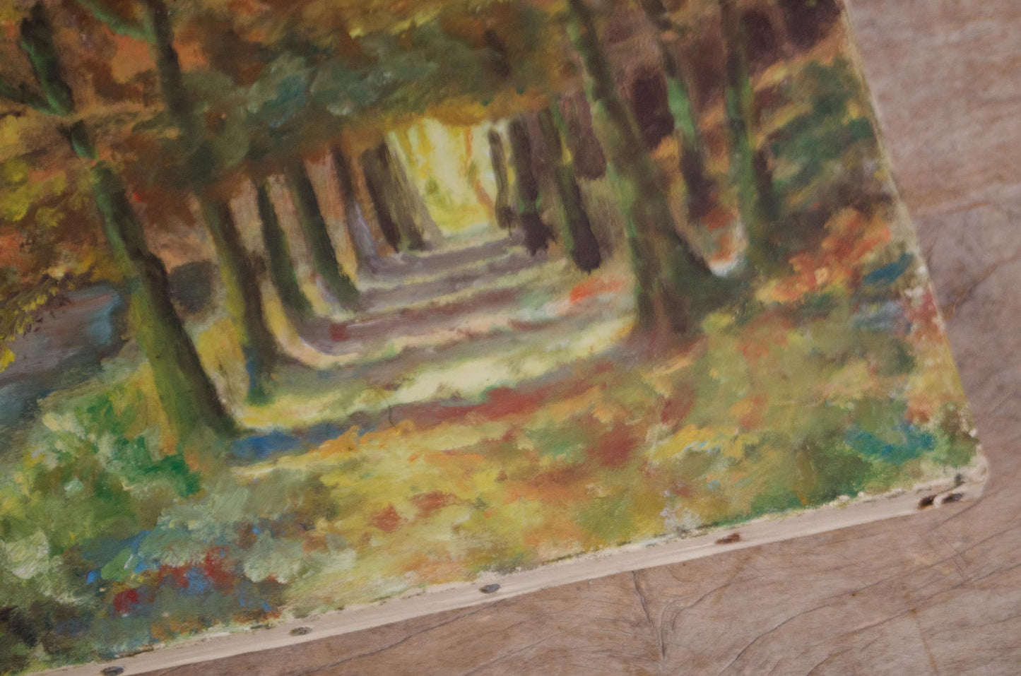 Vintage oil painting with autumn trees and blue water