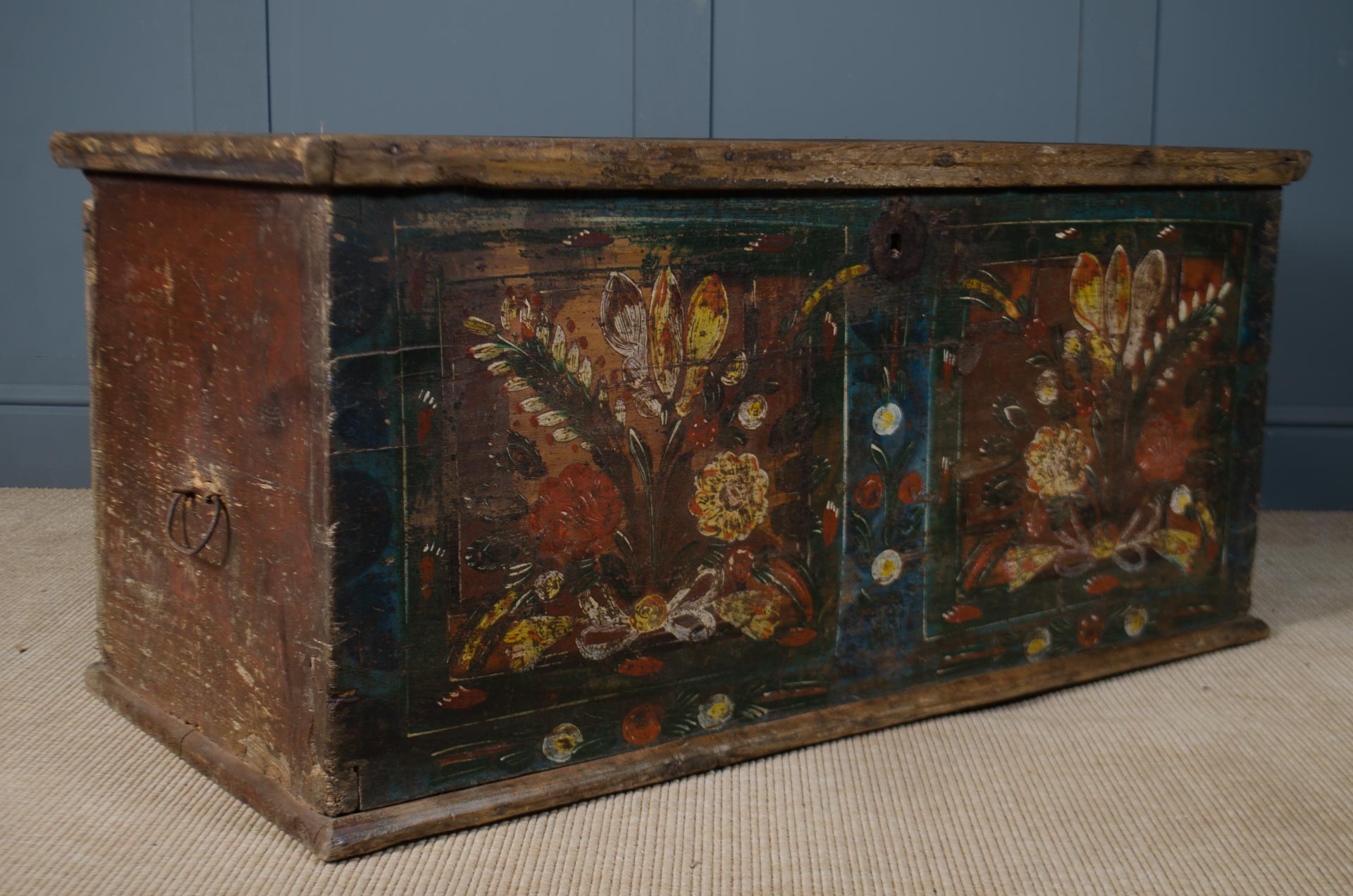 
Antique Hungarian folk art hand-painted wooden storage chest with floral decoration