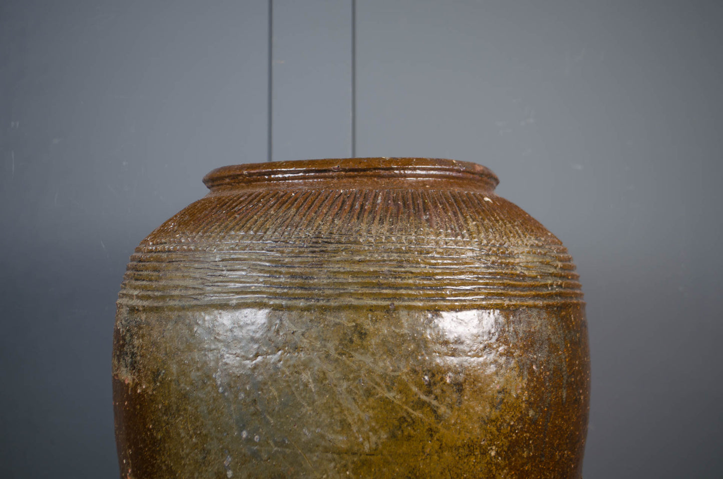 Weathered antique Chinese pottery jars with rich brown glaze