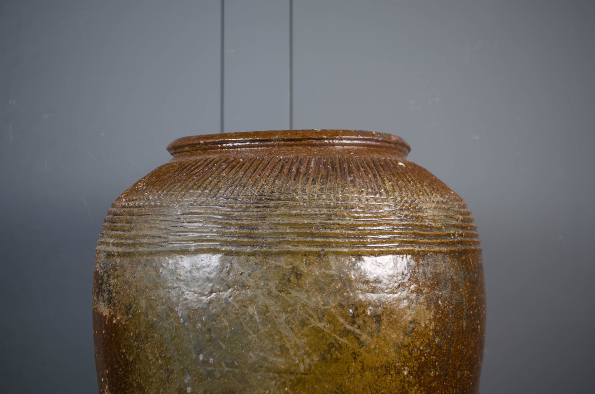 
Weathered antique Chinese pottery jars with rich brown glaze
