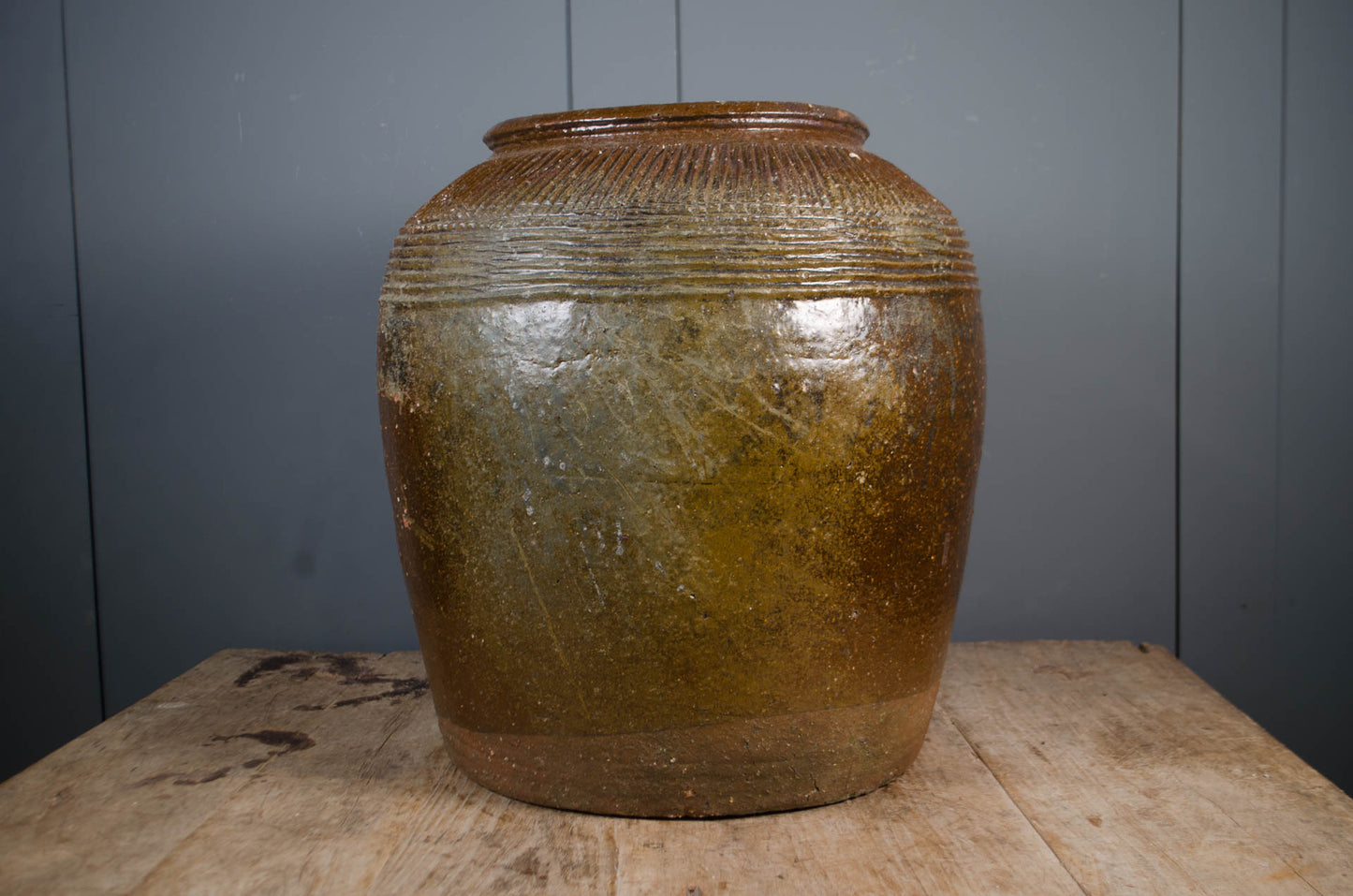 Antique brown glazed Shanxi rice wine jar with decorative geometric banding