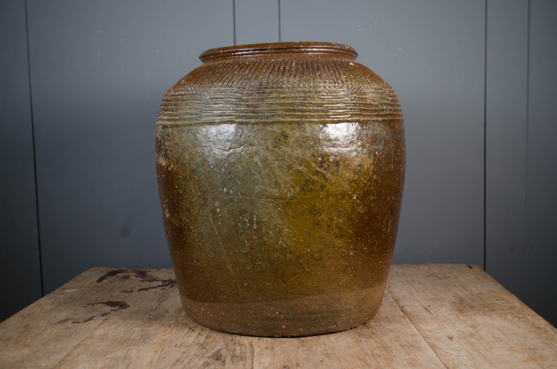 
Antique brown glazed Shanxi rice wine jar with decorative geometric banding
