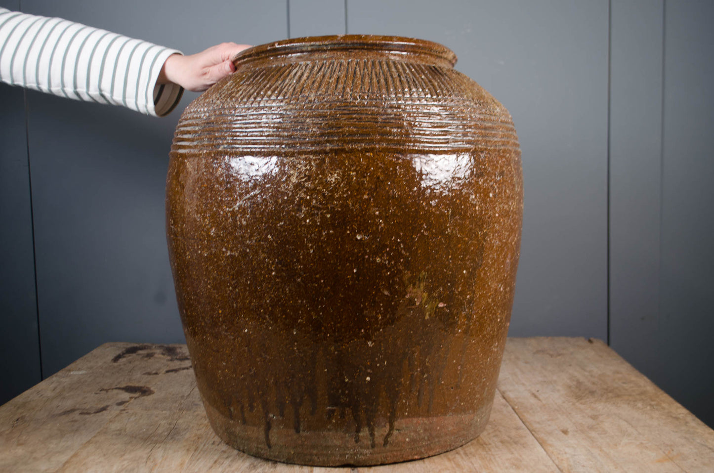 Rustic hand-thrown Chinese pottery preserve vessel with textured detail