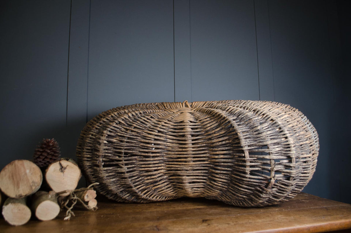 
19th century French grape harvesting donkey buttocks basket