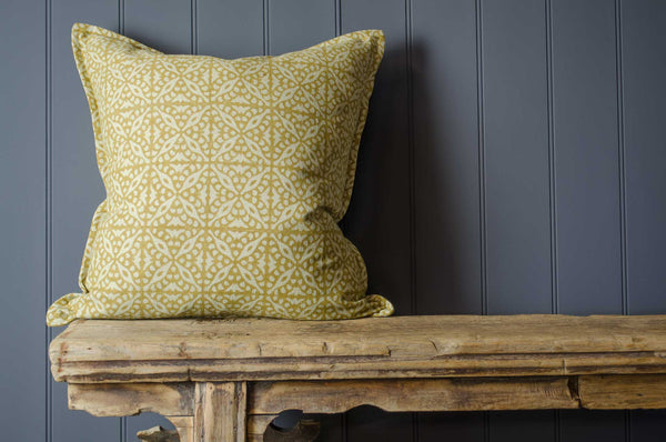 mustard printed linen cushion